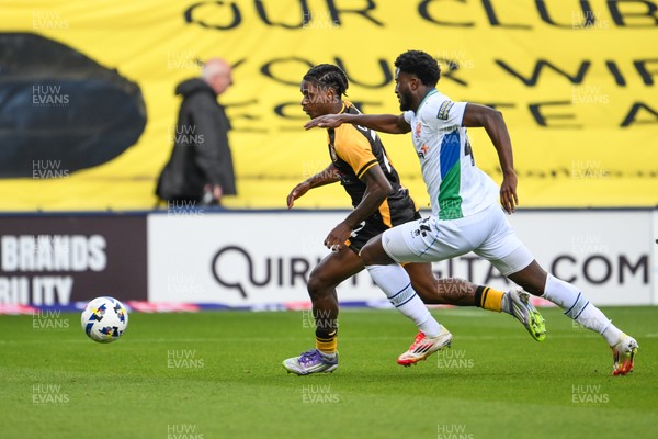 130925 - Tranmere Rovers v Newport County - Sky Bet League 2 - Habeeb Ogunneye of Newport County breaks away from Nohan Kenneh of Tranmere Rovers