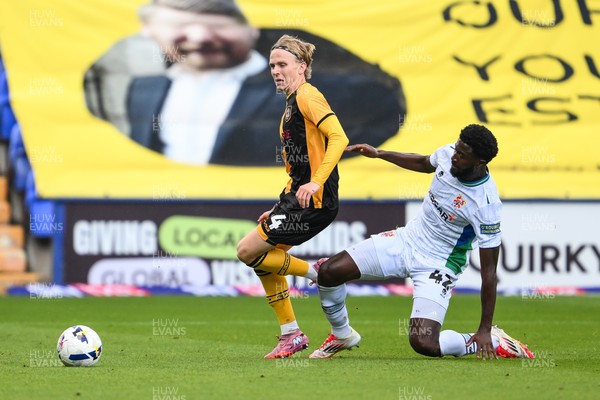 130925 - Tranmere Rovers v Newport County - Sky Bet League 2 - Sammy Braybrooke of Newport County skips past the tackle of Nohan Kenneh of Tranmere Rovers