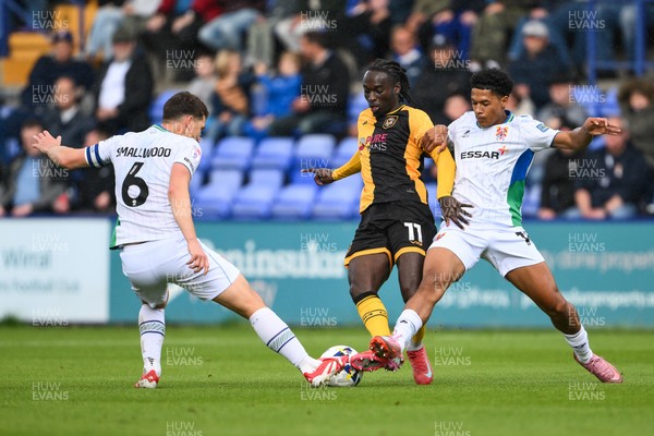 130925 - Tranmere Rovers v Newport County - Sky Bet League 2 - Cameron Antwi of Newport County and Richard Smallwood of Tranmere battle for the ball