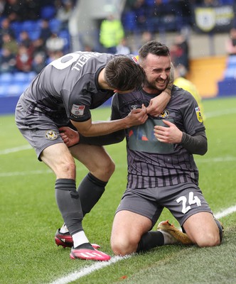 180323 - Tranmere Rovers v Newport County - Sky Bet League 2 - Aaron Wildig of Newport County scores the opening goal…cele with Charlie McNeill of Newport County 