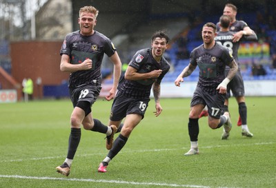 180323 - Tranmere Rovers v Newport County - Sky Bet League 2 - Charlie McNeill of Newport County cele on 2nd team goal in 1st half with Will Evans of Newport County and Scot Bennett of Newport County