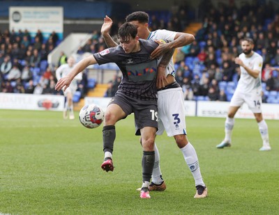 180323 - Tranmere Rovers v Newport County - Sky Bet League 2 - Charlie McNeill of Newport County is held back by Ethan Bristow of Tranmere Rovers in the goalmouth