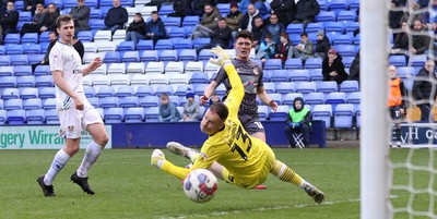 180323 - Tranmere Rovers v Newport County - Sky Bet League 2 - Calum Kavanagh of Newport County puts the 3rd goal past Goalkeeper Joe Murphy of Tranmere Rovers