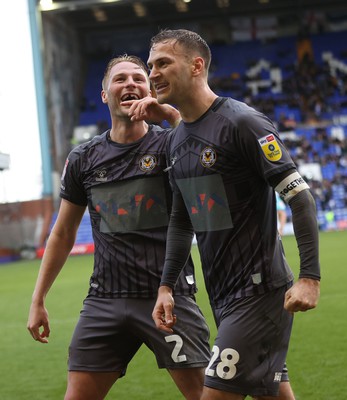 180323 - Tranmere Rovers v Newport County - Sky Bet League 2 - Calum Kavanagh of Newport County puts the 3rd goal past Goalkeeper Joe Murphy of Tranmere Rovers…cele by Cameron Norman of Newport County and Mickey Demetriou of Newport County