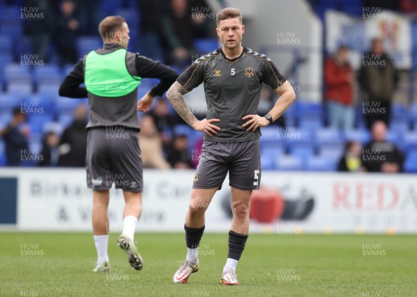 180323 - Tranmere Rovers v Newport County - Sky Bet League 2 - James Clarke of Newport County and Mickey Demetriou of Newport County warm up