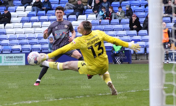 180323 - Tranmere Rovers v Newport County - Sky Bet League 2 - Calum Kavanagh of Newport County puts the 3rd goal past Goalkeeper Joe Murphy of Tranmere Rovers