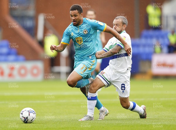 210821 - Tranmere Rovers v Newport County - Sky Bet League 2 - Jermaine Hylton of Newport County tries to outrun Jay Spearing of Tranmere Rovers
