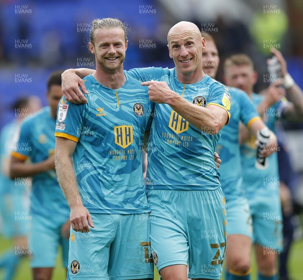 210821 - Tranmere Rovers v Newport County - Sky Bet League 2 - Alex Fisher of Newport County and Kevin Ellison of Newport County celebrate at the end of the match