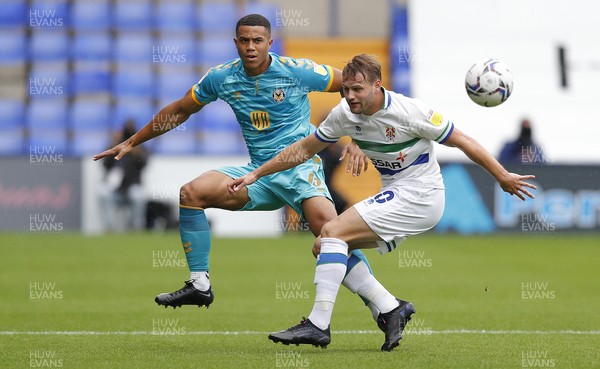 210821 - Tranmere Rovers v Newport County - Sky Bet League 2 - Priestley Farquharson of Newport County and Elliott Nevitt of Tranmere Rovers