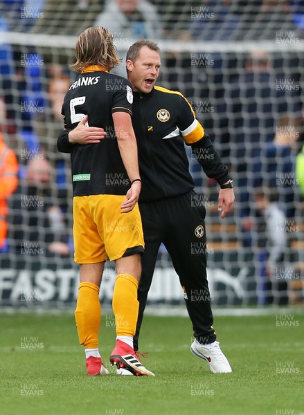 220918 - Tranmere Rovers v Newport County - Sky Bet League 2 - Frazier Franks of Newport County is hugged by Manager Mike Flynn of Newport County at the end of the match