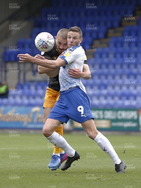 220918 - Tranmere Rovers v Newport County - Sky Bet League 2 - Dan Butler of Newport County and Paul Mullin of Tranmere Rovers