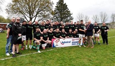 260425 - Tredegar Ironsides v Magor - Admiral National League 5 East - Colin Wilks of the WRU presents the league trophy to club captain Zac Davies