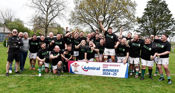 260425 - Tredegar Ironsides v Magor - Admiral National League 5 East - Club captain Zac Davies and his team celebrate with the league trophy