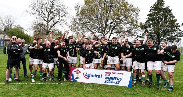 260425 - Tredegar Ironsides v Magor - Admiral National League 5 East - Club captain Zac Davies and his team celebrate with the league trophy