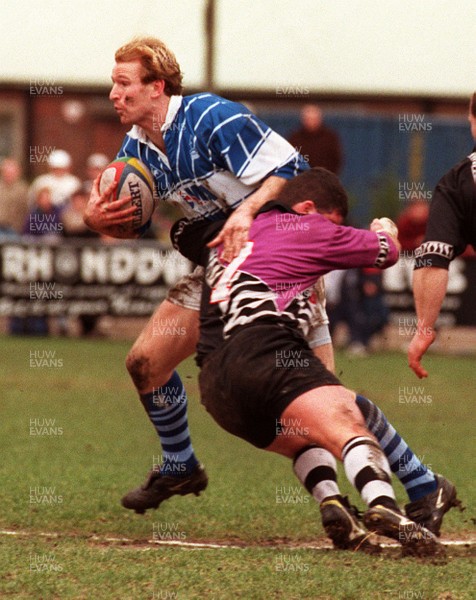 010397 - Treorchy v Bridgend - SWALEC Cup - Gareth Thomas of Bridgemd is tackled by Gavin Owen