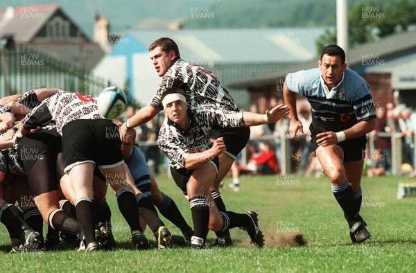 140996 - Treorchy v Cardiff - Carl Hammans of Treorchy passes under pressure from Hemi Taylor