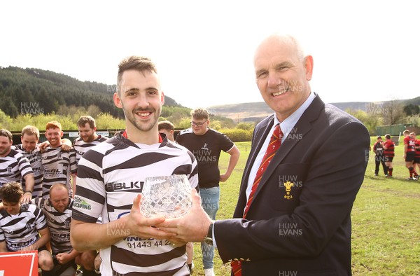 150417 - Treorchy RFC v Dowlais RFC - WRU  Division 1 East Central - Captain of Treorchy Jordan Lloyd receives the League trophy from Robert Butcher of WRU  