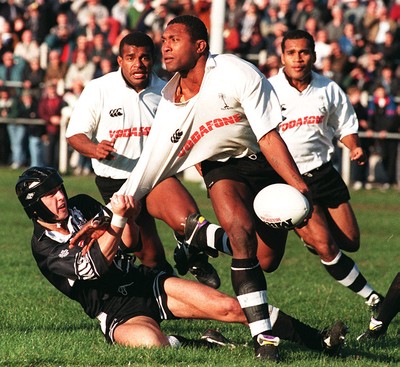 011195 - Treorchy v Fiji - Waisiki Masirewa is tackled by Carl Hamans