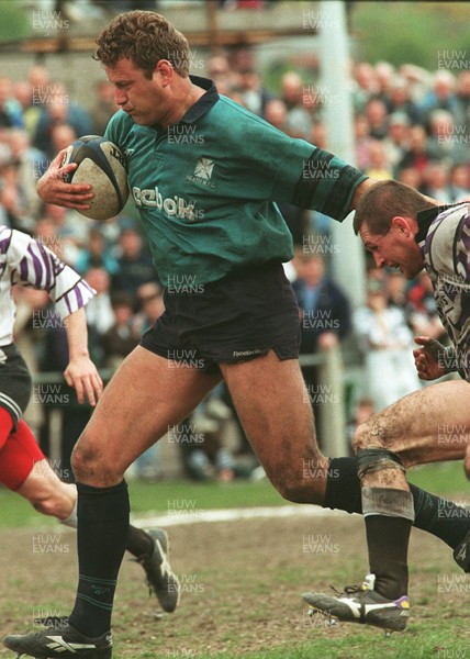 110596 - Treorchy v Neath - Glen Llewellyn of Neath hands off Dafydd Owen to score try