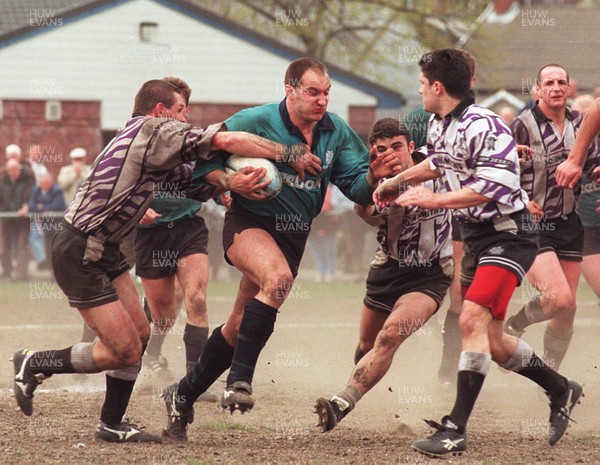 110596 - Treorchy v Neath - Ian Boobyer of Neath is tackled by Andrew Thomas