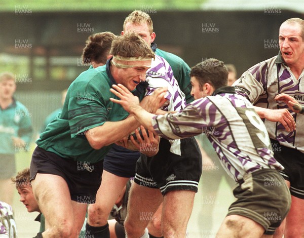 110596 - Treorchy v Neath - Steve Williams of Neath is tackled by Chris Rees