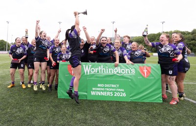 310526 - Treorchy Women celebrate as they win the Worthington’s Mid District Trophy Final