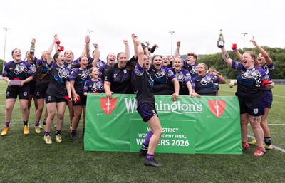 310526 - Treorchy Women celebrate as they win the Worthington’s Mid District Trophy Final