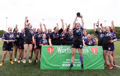 310526 - Treorchy Women celebrate as they win the Worthington’s Mid District Trophy Final