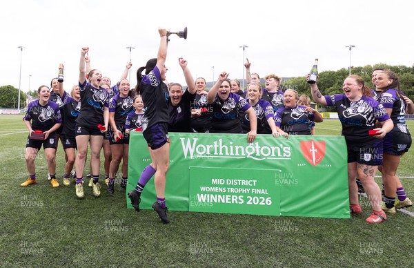 310526 - Treorchy Women celebrate as they win the Worthington’s Mid District Trophy Final