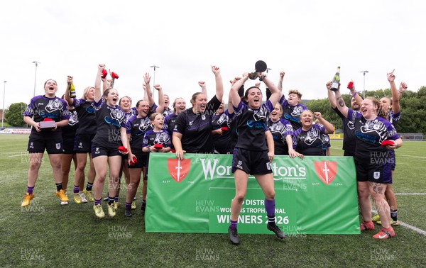 310526 - Treorchy Women celebrate as they win the Worthington’s Mid District Trophy Final