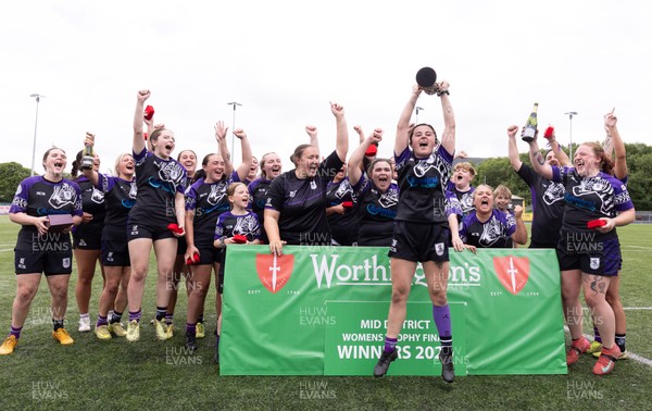 310526 - Treorchy Women celebrate as they win the Worthington’s Mid District Trophy Final