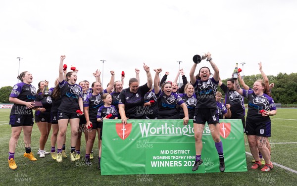 310526 - Treorchy Women celebrate as they win the Worthington’s Mid District Trophy Final