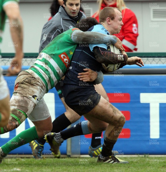 130216 - Treviso v Cardiff Blues - Guinness PRO12 -  Dan Fish of Blues is tackled