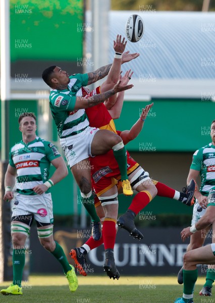 070418 - Benetton Treviso v Dragons - Guinness PRO14 -  Monty Ioane of Treviso competes with Rynard Landman and Zane Kirchner of Dragons for a high ball 