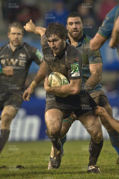 200113 Benetton Treviso v Ospreys - Heineken Cup - Ospreys' Andrew Bishop launches an attack 