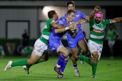 011016 - Benetton Treviso v Scarlets - Guinness Pro12 -Liam Williams of Scarlets is tackled by Tommaso Benvenuti