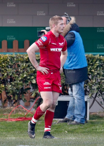 110218 - Benetton Treviso v Scarlets - Guinness Pro14 - Round 14 - Johnny McNicholl looks dejected following Benetton Treviso's try scored by Monty Ioane 