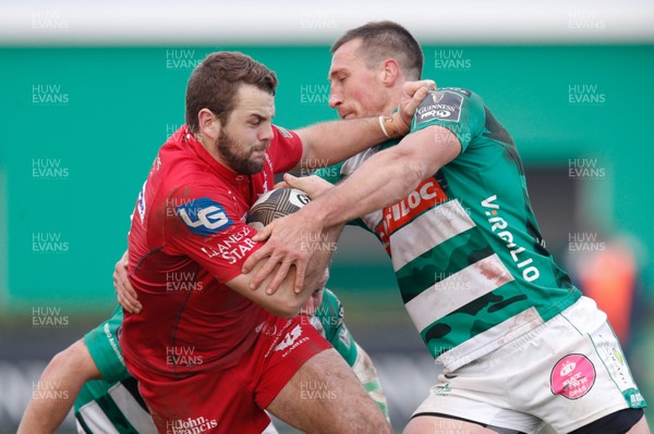 110218 - Benetton Treviso v Scarlets - Guinness Pro14 - Round 14 - Paul Asquith is tackled by Alberto Sgarbi