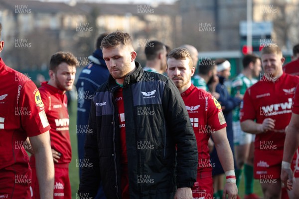 110218 - Benetton Treviso v Scarlets - Guinness Pro14 - Round 14 - Scarlets players look dejected following the match