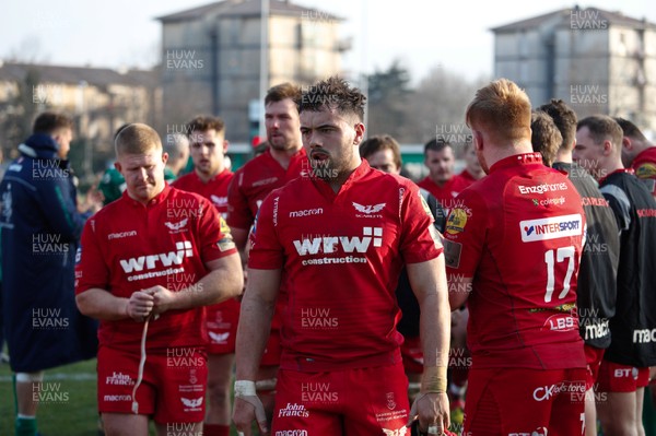 110218 - Benetton Treviso v Scarlets - Guinness Pro14 - Round 14 - Scarlets players look dejected following the match