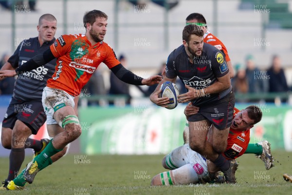 161217 - Benetton Treviso v Scarlets - European Rugby Champions Cup -  Paul Asquith of Scarlets tackled by Federico Ruzza of Benetton Treviso
