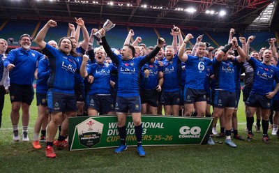190426 - Tumble v New Dock Stars, Mens Division 3 Cup Final - New Dock Stars Captain Jordan Williams lifts the trophy with the team
