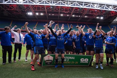 190426 - Tumble v New Dock Stars, Mens Division 3 Cup Final - New Dock Stars Captain Jordan Williams lifts the trophy with the team