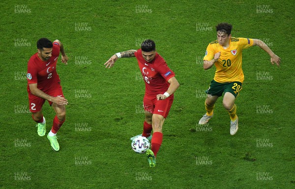 160621 - Turkey v Wales - Euro 2020 - Group A - Ozan Tufan of Turkey is challenged by Daniel James of Wales