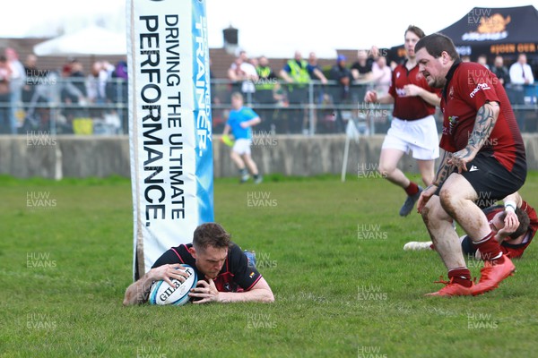 150423 - UK International Gay Rugby Grand Finals - Swansea Gladiators (Maroon) take on Bristol Bisons (Purple/Black) in the opening fixture