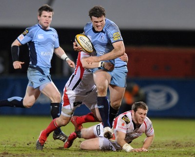 03.04.10 - Ulster v Cardiff Blues - Magners League - Jamie Roberts of Cardiff Blues is tackled by Paddy Wallace of Ulster. 