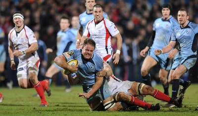 03.04.10 - Ulster v Cardiff Blues - Magners League - Xavier Rush of Cardiff Blues is tackled by Chris Henry of Ulster. 