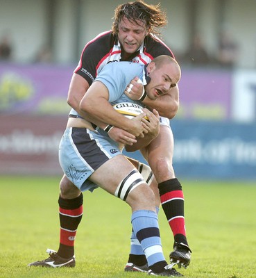 14.10.06 - Ulster v Cardiff Blues Ulster's Neil Best with Mark Lewis of Cardiff 