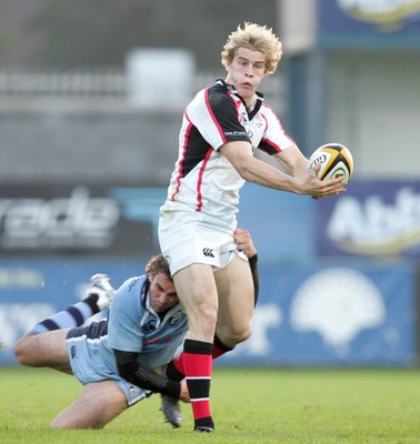 14.10.06 - Ulster v Cardiff Blues Ulster's Andrew Trimble with Nick Robinson of Cardiff 