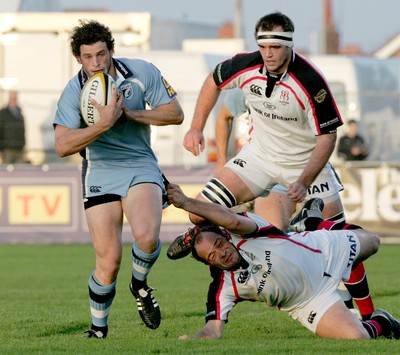 14.10.06 - Ulster v Cardiff Blues Ulster's Rory Best and Matt McCullough can't stop Nick Macleod of Cardiff 